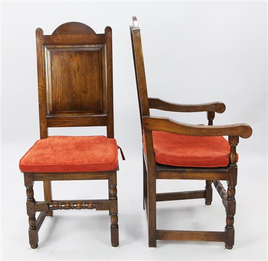 A modern set of eight oak panelled high back dining chairs including two carvers, carver height 4ft.